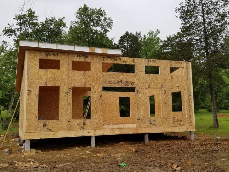 photo of a modern house kit on a pier and beam foundation