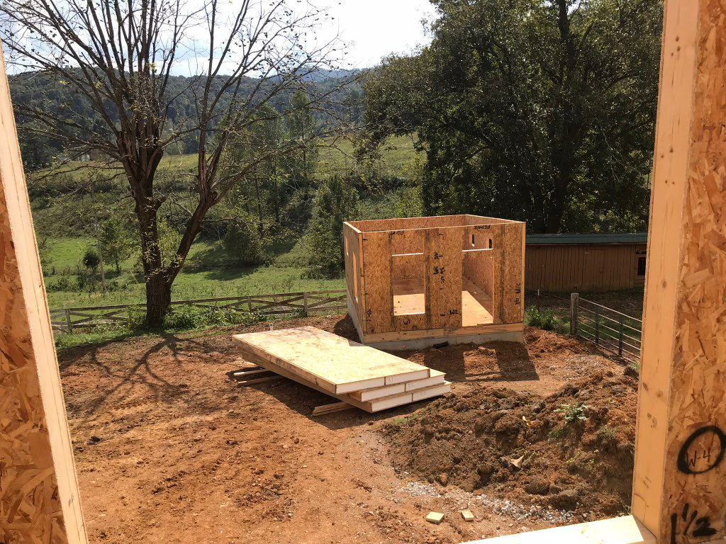 MSH 20190528 customer build modern outdoors construction SI Ps no roof pallet framed shot shed PX