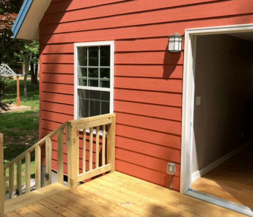 MSH 20190910 finished red panels outdoors exterior rear view porch PX min