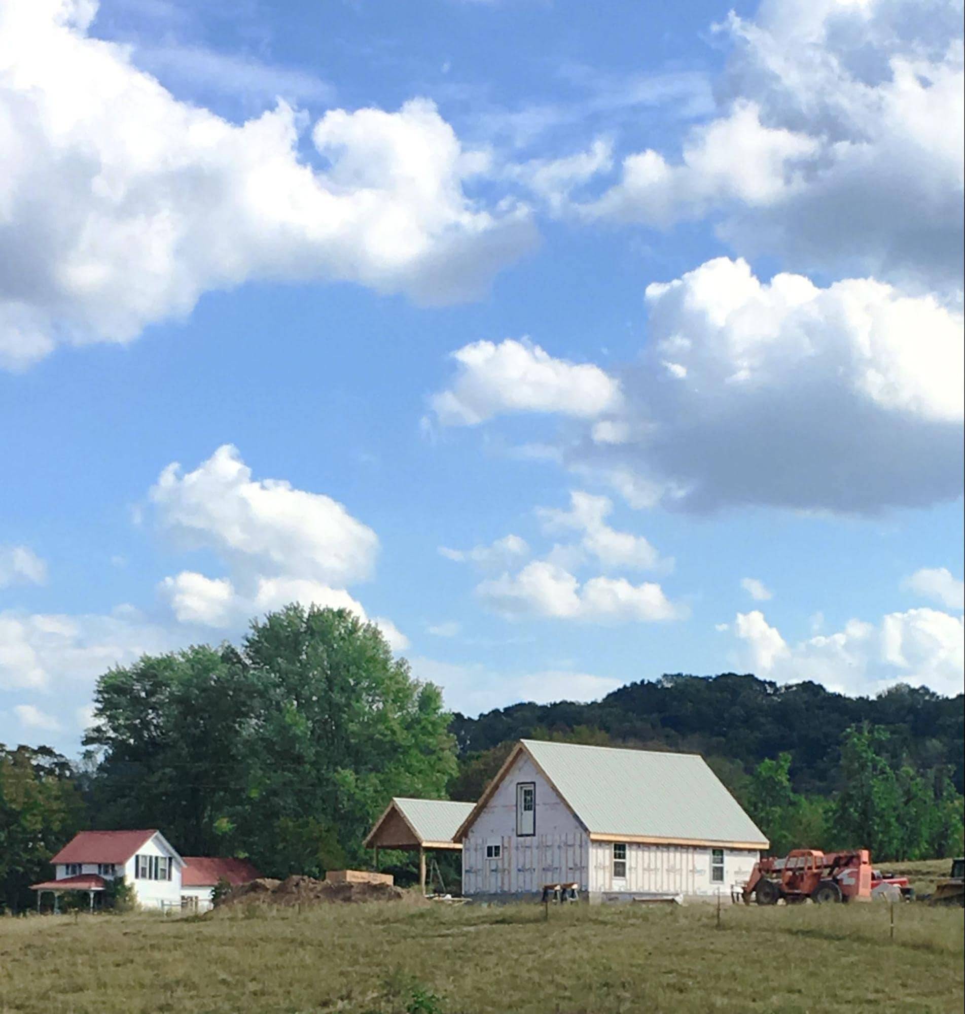 MSH 20191023 pulaski tennessee tn cottage outdoors construction long distant shot vehicles PX min