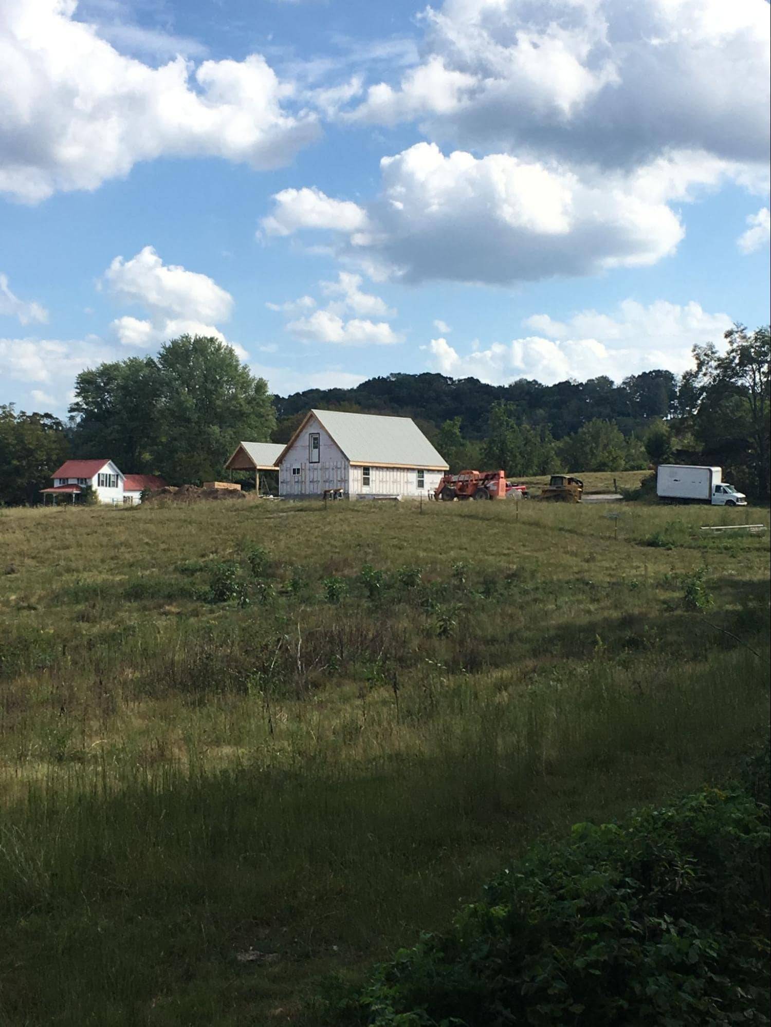 MSH 20191023 pulaski tennessee tn cottage outdoors construction longer distant shot vehicles PX min