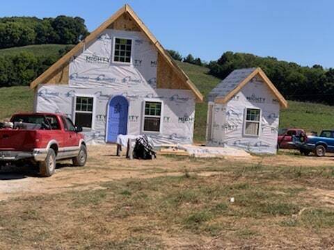 MSH 20191023 pulaski tennessee tn cottage outdoors construction waterproofing wide shot shed vehicles front side view PX min