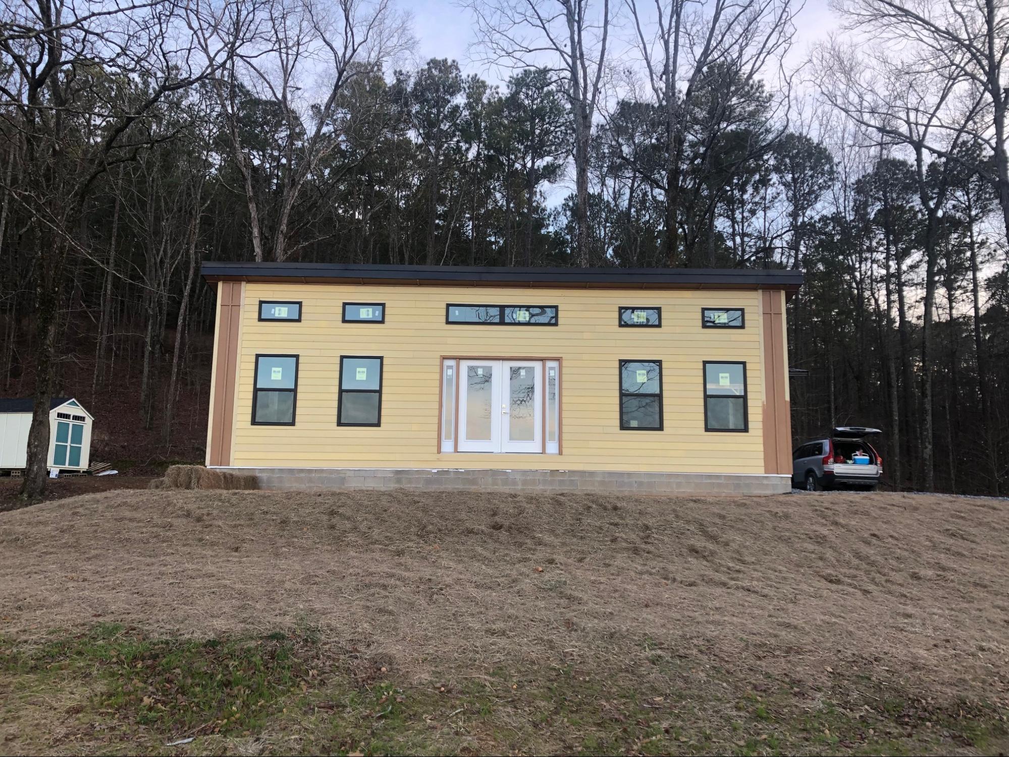 MSH 20200214 outdoors finished Winter yellow paneling front side view PX