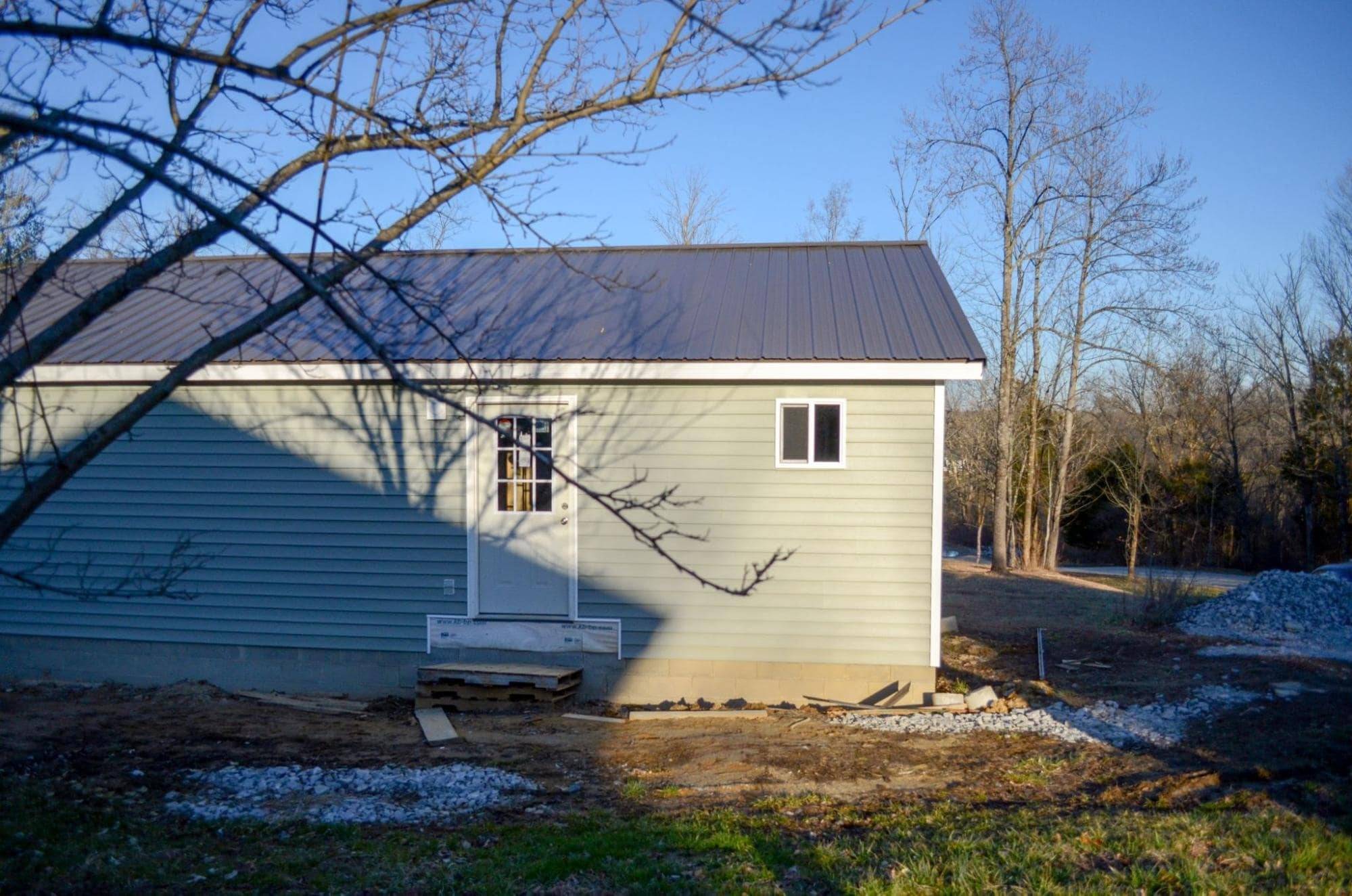 MSH 20200406 outdoors finished Grey Paneling Rear View lagrange kentucky ranch PX min