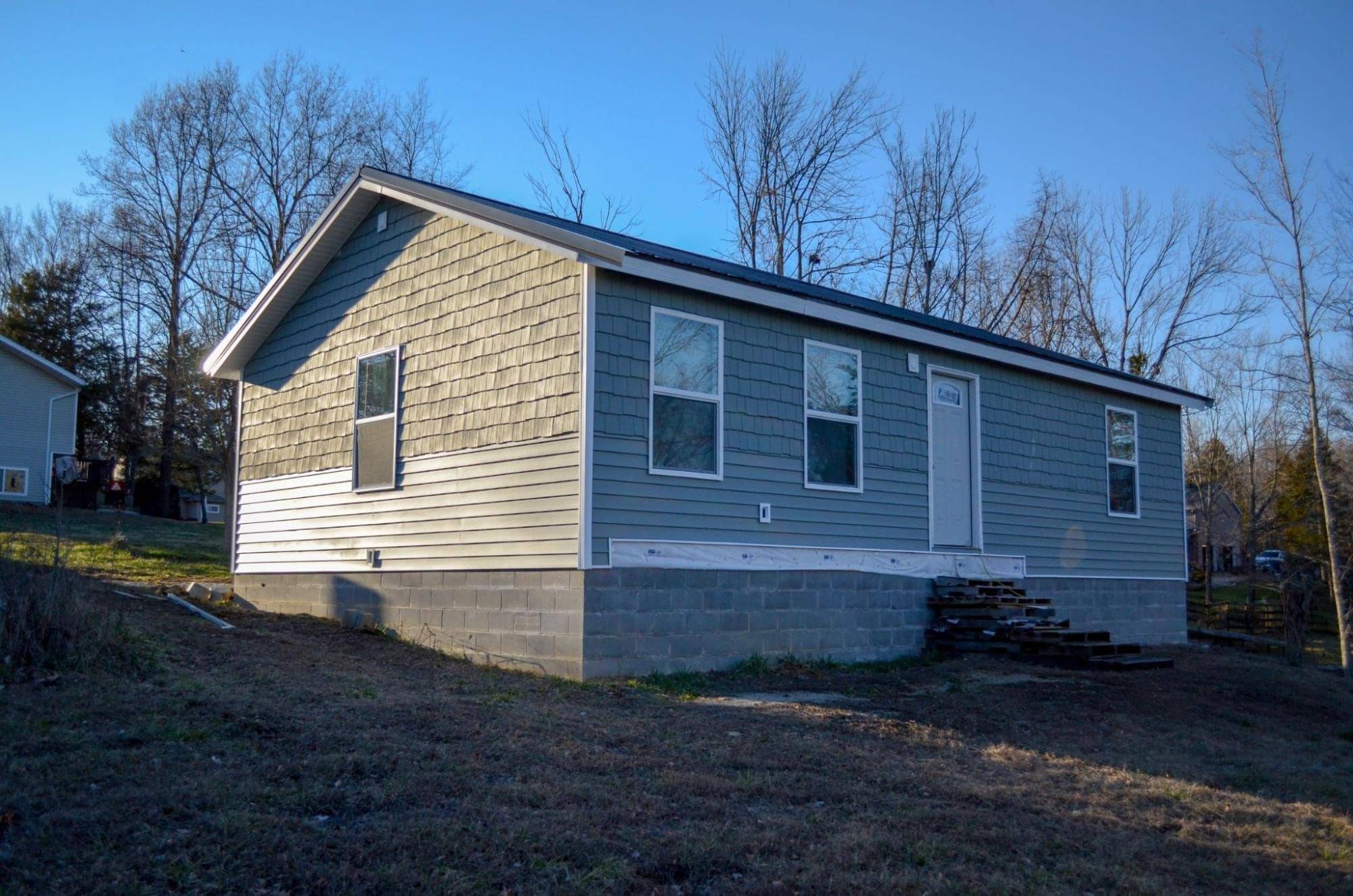 MSH 20200406 outdoors finished Grey Paneling Winter Front Left Side View lagrange kentucky ranch PX min