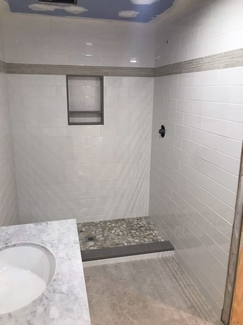 MSH 20210618 rural suburb New York City indoors finished white tile marble sink medium shot PX min