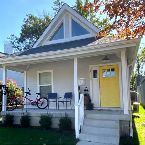 MSH 20230526 louisville kentucky ky payne cottage urban outdoors finished front side view yellow door PX