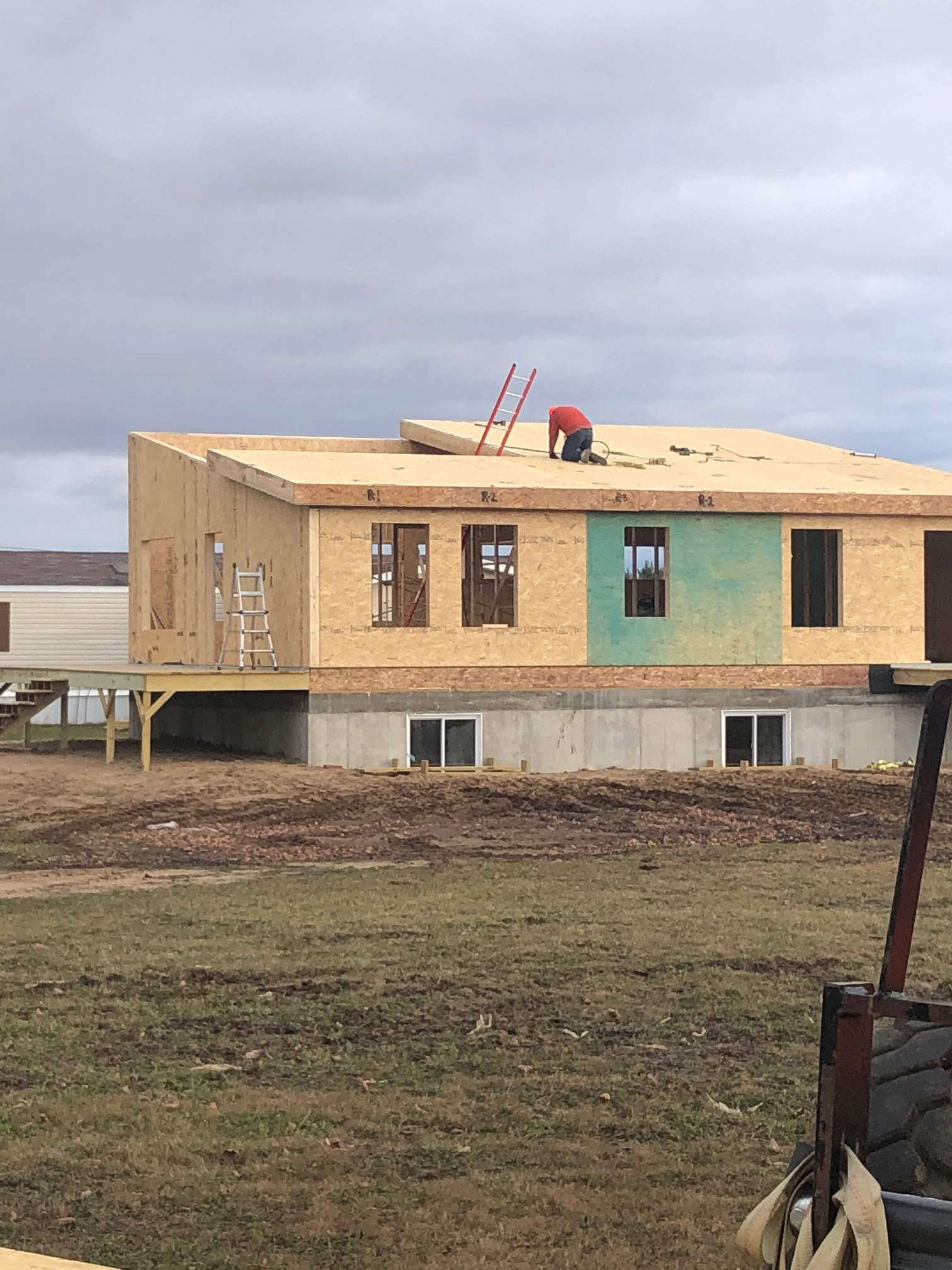 Wide shot of the Michigan Modern Customer Build with half of the roof panels installed.