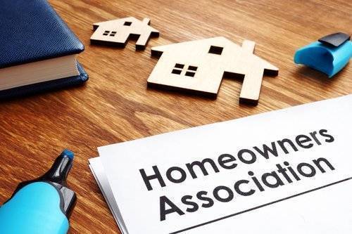 photo of house items and homeowners association form