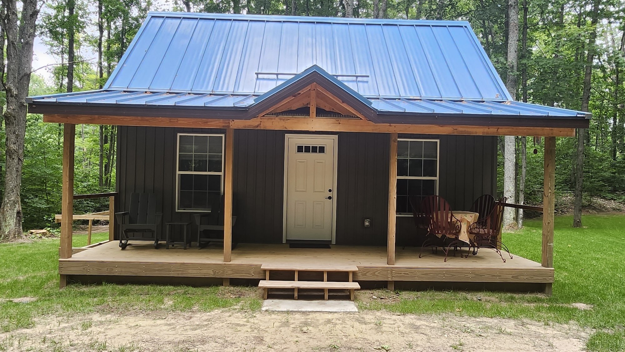 image shows front view of mighty small homes cottage model build in mancelonia