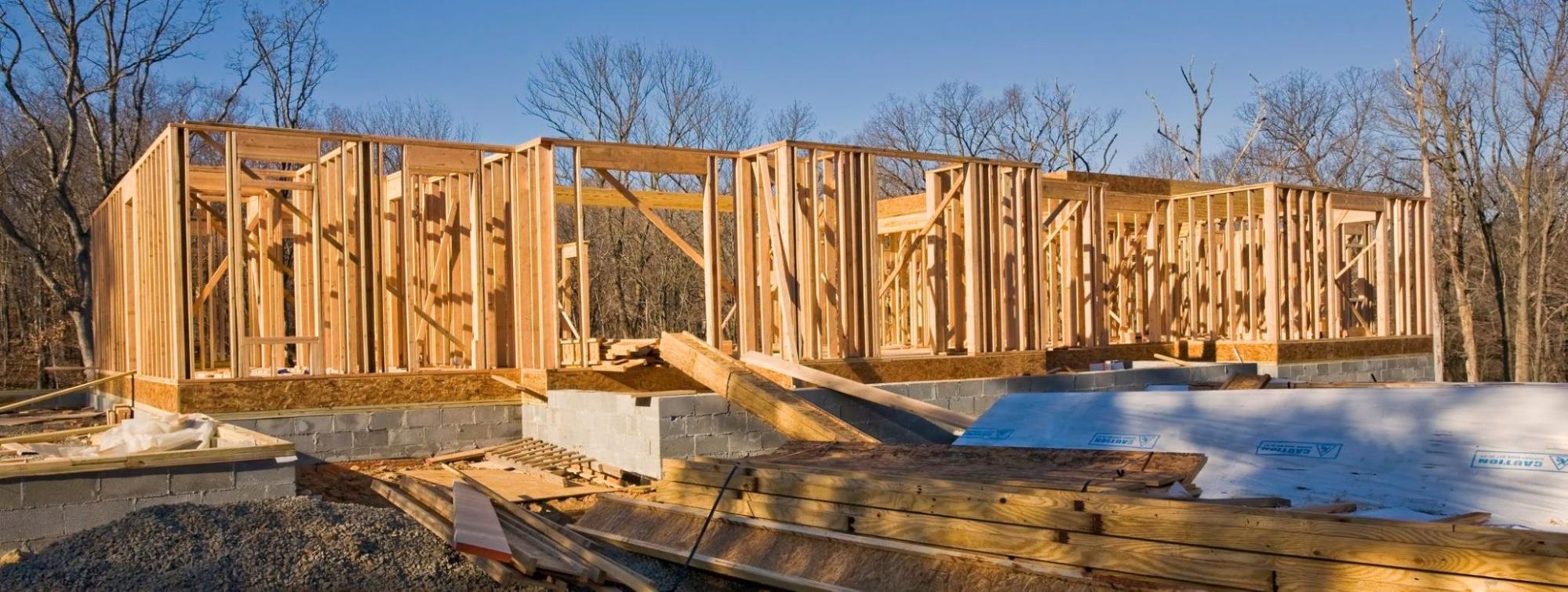 stick home under construction with exposed studs
