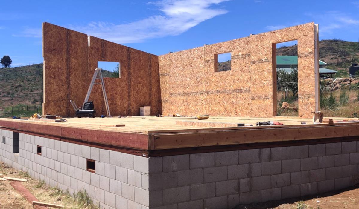 Image of a Modern as the rear and side wall are being erected