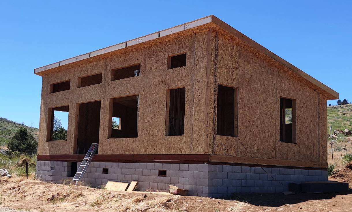Image of a modern after outer walls and roof panels have been installed