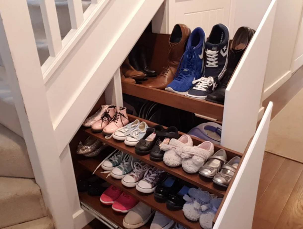 Photo of a storage area under the stairs
