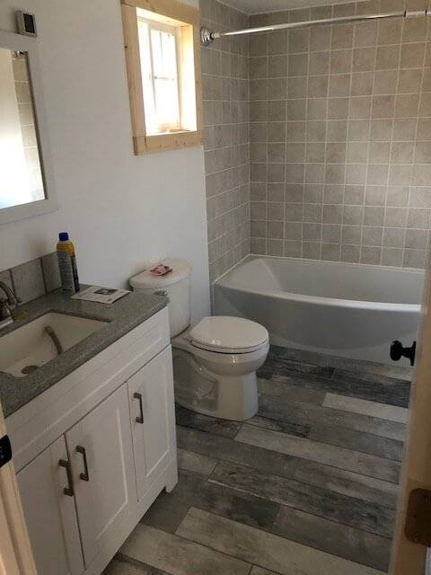 Photo of finished bathroom in a Cottage