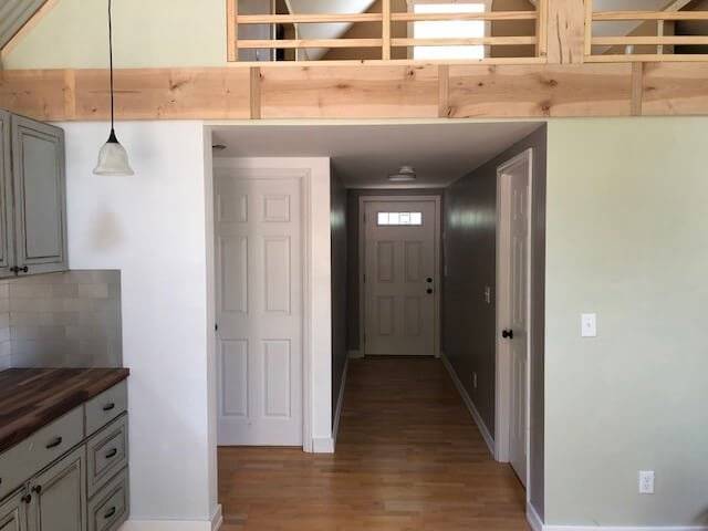 Photo showing part of the kitchen and loft of a Cottage