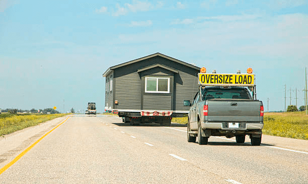 transporting completed trailer home on interstate highway