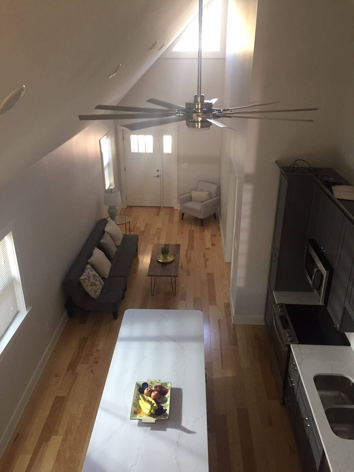 Photo showing the view looking down from the loft of a custom Cottage