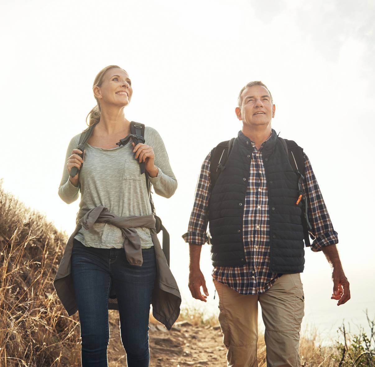 Image of a middle-aged couple out for a hike